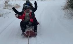 Malatya'da traktör arkasında karda 'sörf'