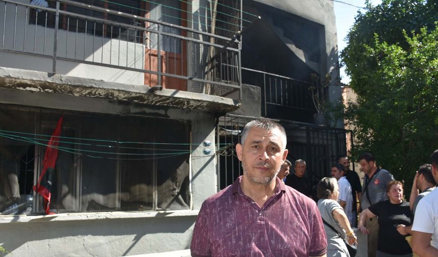 İzmir'de 3 katlı binada yangın paniği; Defne'yi mahalleli kurtardı