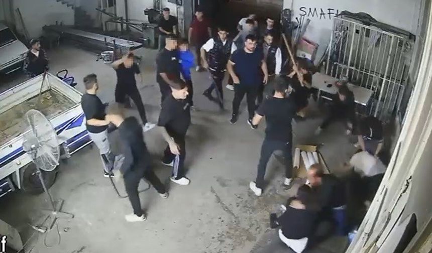 Sopa, kürek ve av tüfekli meydan savaşını andıran kavga kamerada