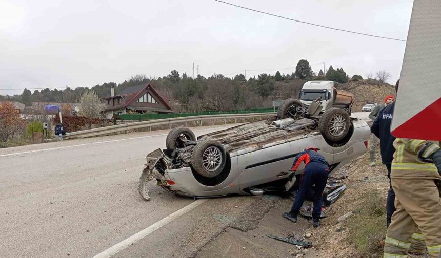 Takla atan otomobilden yara almadan kurtuldu
